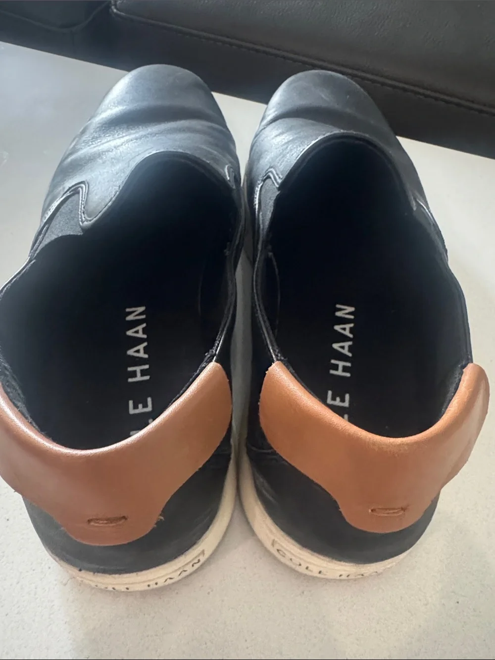 Cole Haan Black Leather Slip-On Sneakers with Brown Heel Tab